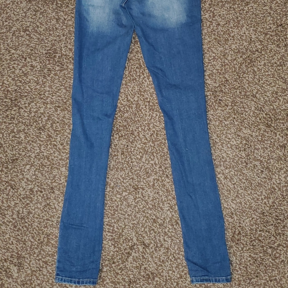 Ripped woman jeans - Picture 4 of 4